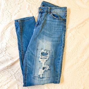 Distressed denim jeans